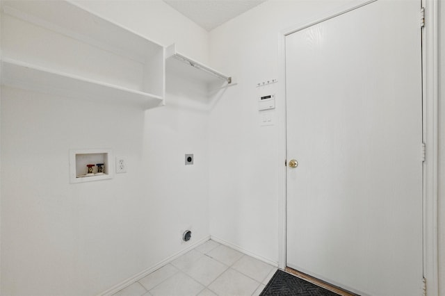 218 Whispering Dell Ln, Weatherford, TX 76085 - clothes washing area with washer hookup, electric dryer hookup, and baseboards