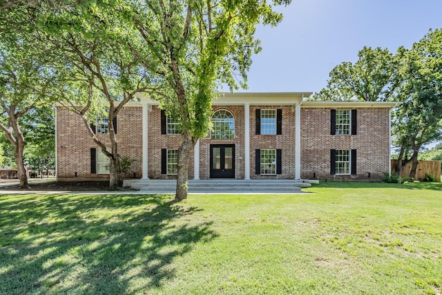 2815 Perkins Rd, Arlington, TX 76016 - neoclassical home featuring brick siding and french doors