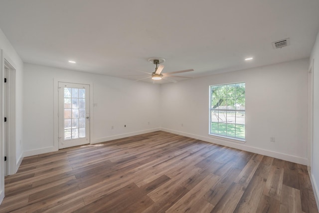2815 Perkins Rd, Arlington, TX 76016 - empty room featuring wood finished floors, a ceiling fan, baseboards, and recessed lighting