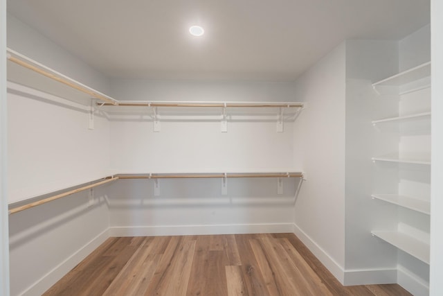 2815 Perkins Rd, Arlington, TX 76016 - spacious closet featuring wood finished floors