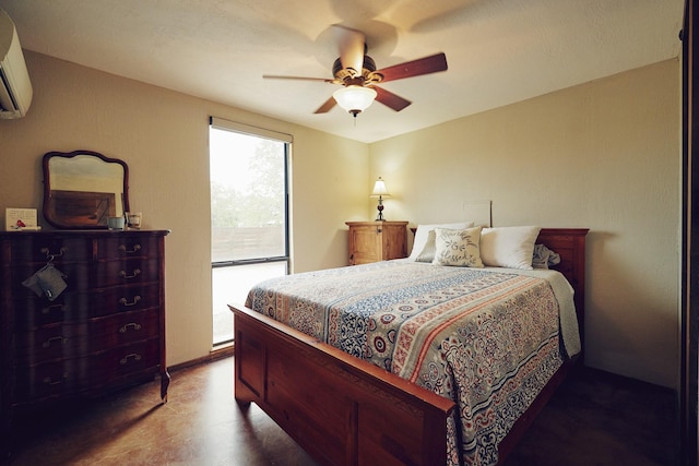 6305 Barrel Spring Rd, Nocona, TX 76255 - bedroom with a wall mounted AC and a ceiling fan