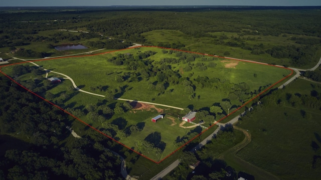 6305 Barrel Spring Rd, Nocona, TX 76255 - aerial view of sparsely populated area featuring property parcel outlined and a heavily wooded area