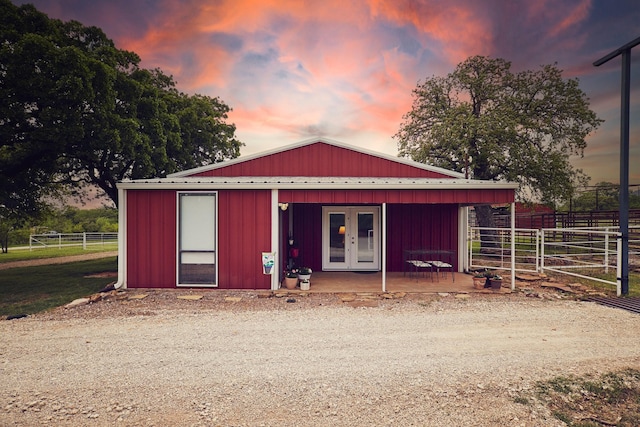 6305 Barrel Spring Rd, Nocona, TX 76255 - view of outdoor structure featuring french doors and fence
