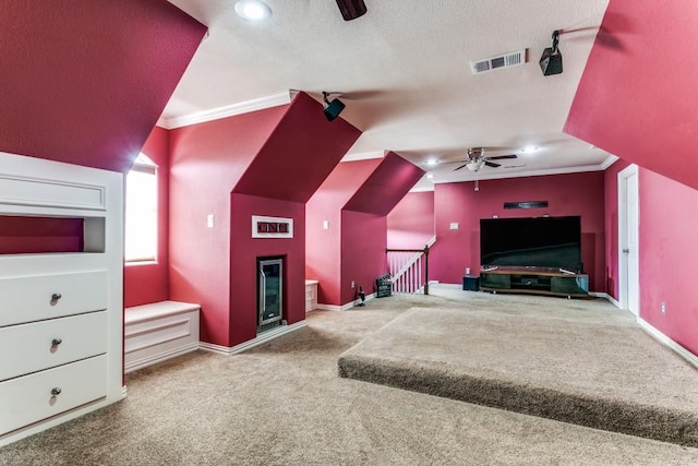 carpeted bedroom with crown molding, baseboards, a textured ceiling, and recessed lighting