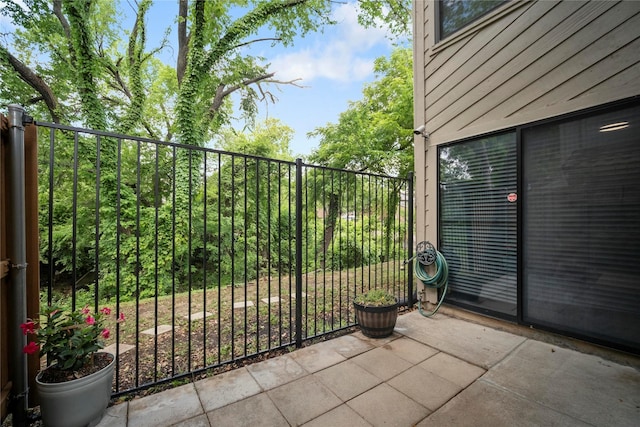 895 Dublin Dr Unit D, Richardson, TX 75080 - gate featuring a patio area