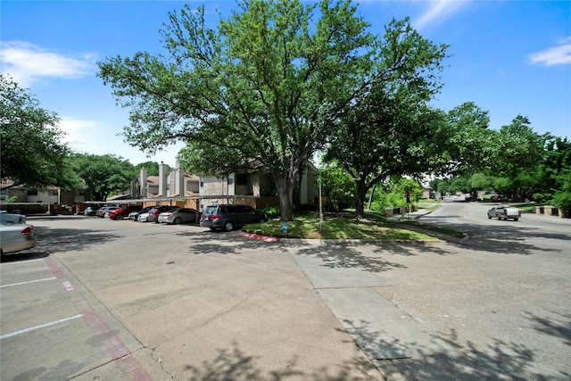 895 Dublin Dr Unit D, Richardson, TX 75080 - view of asphalt street with curbs and sidewalks