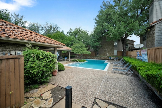 895 Dublin Dr Unit D, Richardson, TX 75080 - community pool featuring a patio and fence