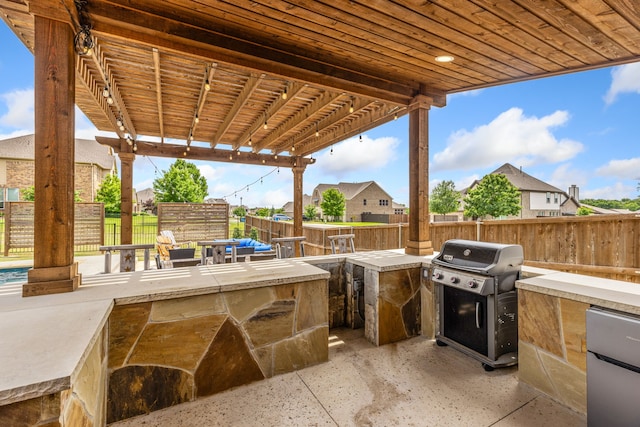 206 Stallion Ln, Hickory Creek, TX 75065 - view of patio with grilling area, fence, area for grilling, and a residential view
