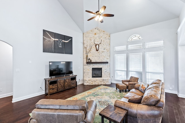 206 Stallion Ln, Hickory Creek, TX 75065 - living room featuring high vaulted ceiling, a ceiling fan, wood finished floors, a stone fireplace, and baseboards