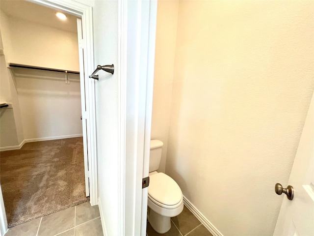 2933 Tenor Way, Sachse, TX 75048 - bathroom with tile patterned floors, toilet, and baseboards