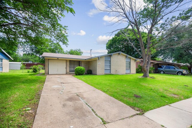 2500 Bamboo St, Mesquite, TX 75150 - mid-century inspired home with driveway and brick siding