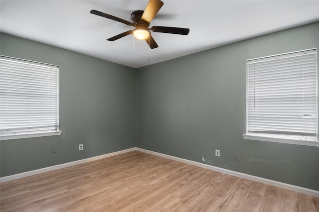 2500 Bamboo St, Mesquite, TX 75150 - spare room featuring light wood finished floors, ceiling fan, and baseboards