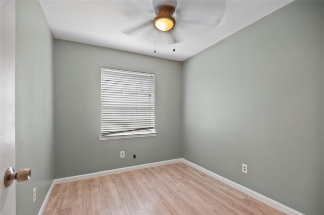 2500 Bamboo St, Mesquite, TX 75150 - spare room featuring ceiling fan, wood finished floors, and baseboards