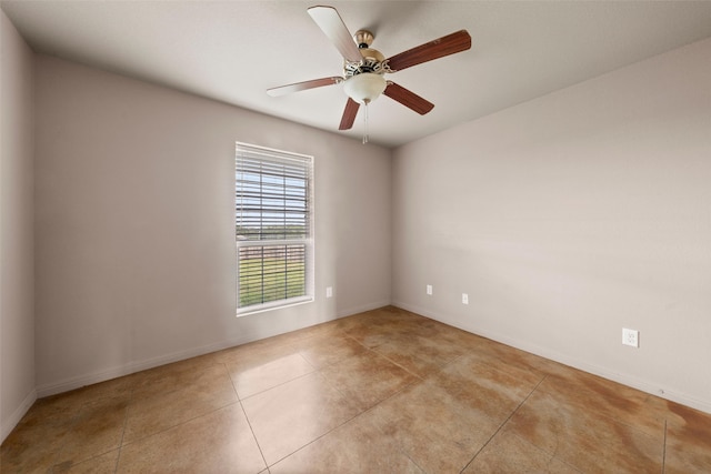 300 Morris St, Riesel, TX 76682 - tiled empty room with a ceiling fan and baseboards