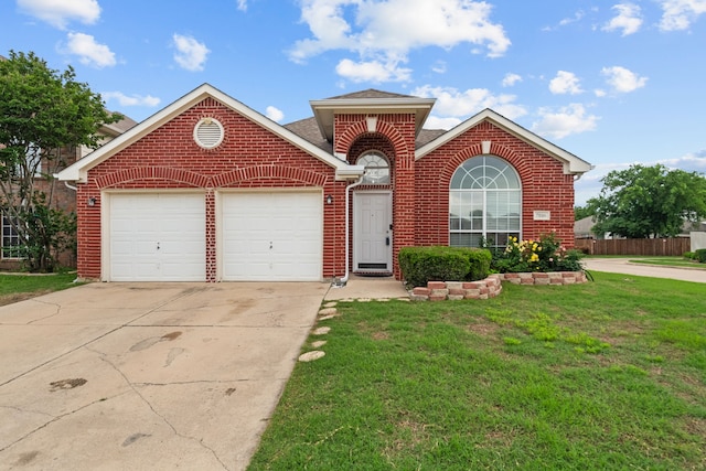 7816 Teal Dr, Fort Worth, TX 76137 - traditional-style house with brick siding, an attached garage, a front lawn, concrete driveway, and a shingled roof