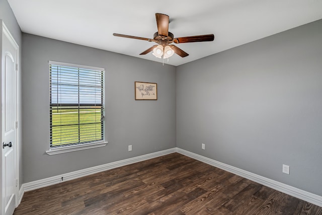 160 Grays Creek Cir, Alma, TX 75119 - empty room with a ceiling fan, dark wood finished floors, and baseboards