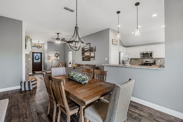 160 Grays Creek Cir, Alma, TX 75119 - dining area featuring ceiling fan, baseboards, dark wood finished floors, recessed lighting, and a chandelier