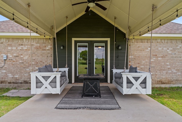 160 Grays Creek Cir, Alma, TX 75119 - view of exterior entry with french doors, a ceiling fan, a patio area, and brick siding