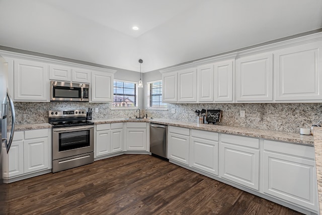 160 Grays Creek Cir, Alma, TX 75119 - kitchen featuring appliances with stainless steel finishes, a sink, tasteful backsplash, dark wood-type flooring, and recessed lighting