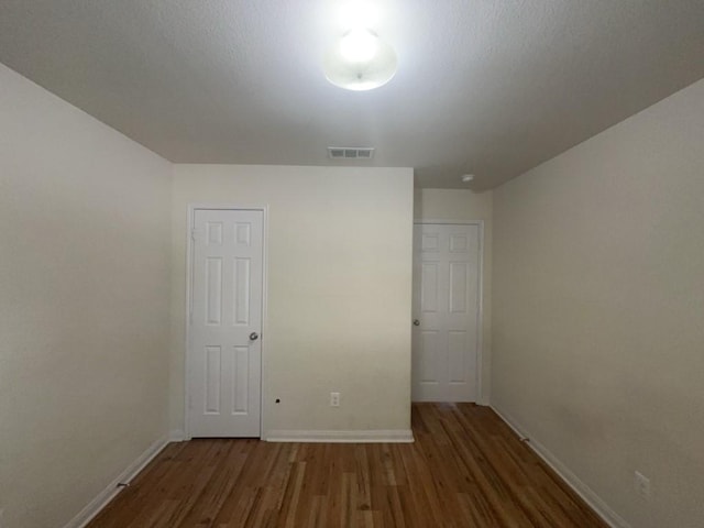 10009 Iron Ridge Dr, Fort Worth, TX 76140 - unfurnished room featuring wood finished floors and baseboards