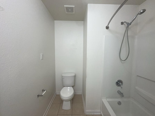 10009 Iron Ridge Dr, Fort Worth, TX 76140 - full bath featuring toilet, tile patterned floors, washtub / shower combination, and baseboards