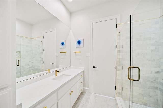 bathroom featuring a stall shower, vanity, marble look tiles, and baseboards
