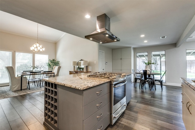 2701 W Prairie Creek Dr, Richardson, TX 75080 - kitchen with island range hood, gas stove, gray cabinetry, a center island, and dark wood-style flooring