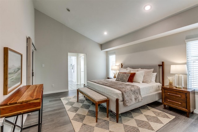 2701 W Prairie Creek Dr, Richardson, TX 75080 - bedroom with dark wood finished floors, high vaulted ceiling, recessed lighting, baseboards, and ensuite bathroom
