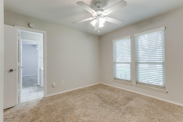 2701 W Prairie Creek Dr, Richardson, TX 75080 - empty room with carpet floors, ceiling fan, a smoke detector, and baseboards