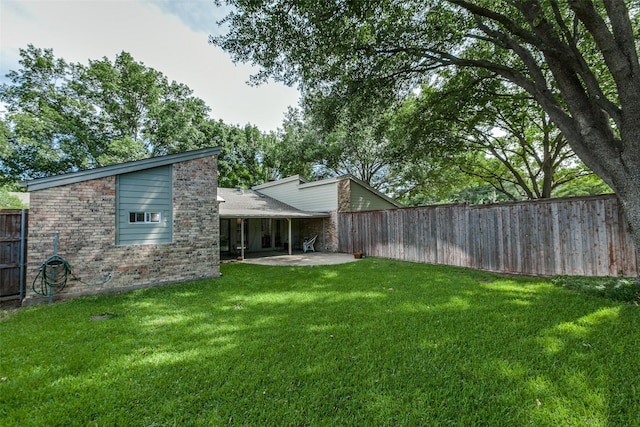 2701 W Prairie Creek Dr, Richardson, TX 75080 - view of yard featuring a patio