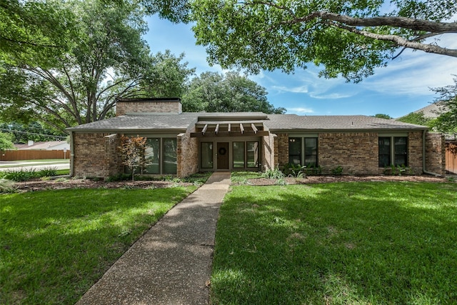 2701 W Prairie Creek Dr, Richardson, TX 75080 - mid-century modern home featuring brick siding and a shingled roof
