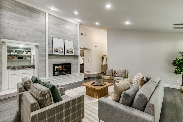 2701 W Prairie Creek Dr, Richardson, TX 75080 - living room with ornamental molding, baseboards, wood finished floors, a tile fireplace, and recessed lighting