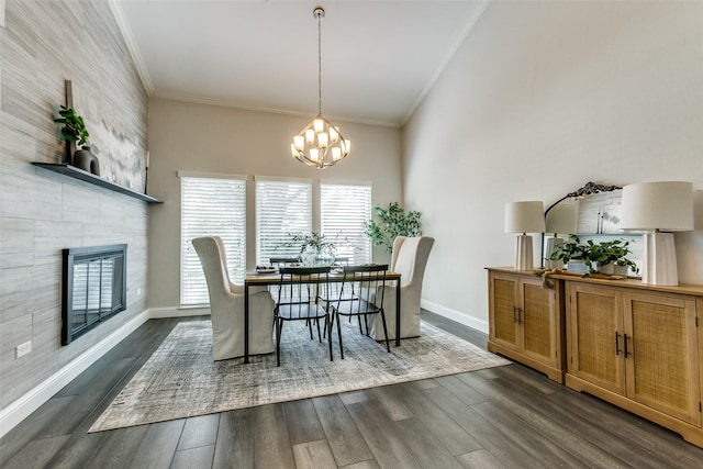 2701 W Prairie Creek Dr, Richardson, TX 75080 - dining room featuring crown molding, a tile fireplace, baseboards, dark wood finished floors, and a chandelier