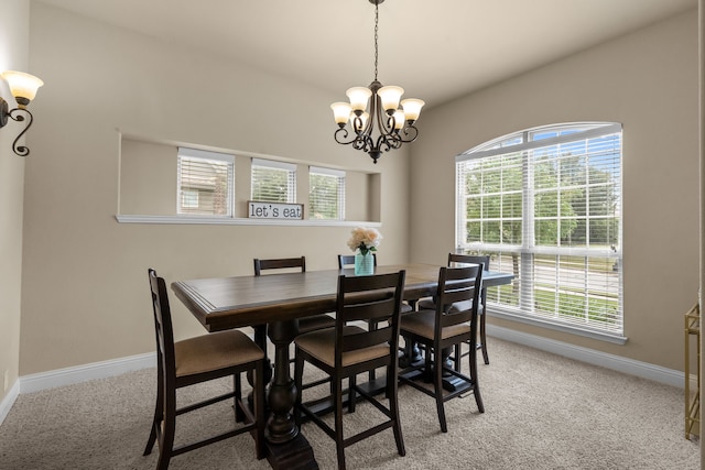 2026 Bay Laurel Dr, Weatherford, TX 76086 - dining room with a chandelier, plenty of natural light, light colored carpet, and baseboards