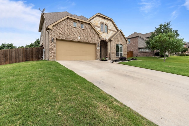 2026 Bay Laurel Dr, Weatherford, TX 76086 - french provincial home with concrete driveway, brick siding, and an attached garage