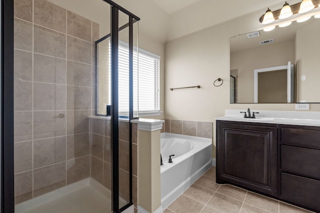 2026 Bay Laurel Dr, Weatherford, TX 76086 - bathroom with tile patterned flooring and a stall shower