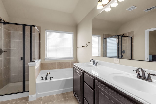 2026 Bay Laurel Dr, Weatherford, TX 76086 - bathroom featuring a stall shower, a bath, tile patterned floors, and double vanity