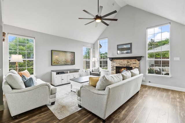 1209 Bel Air Dr, Allen, TX 75013 - living area with a ceiling fan, high vaulted ceiling, a fireplace, dark wood finished floors, and baseboards