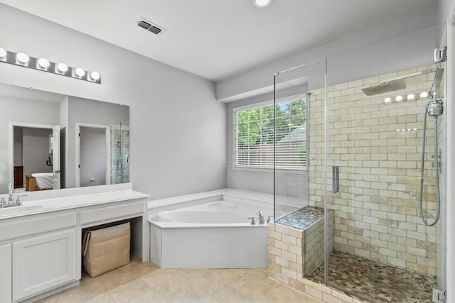1209 Bel Air Dr, Allen, TX 75013 - full bath featuring ensuite bath, a bath, a stall shower, tile patterned floors, and vanity