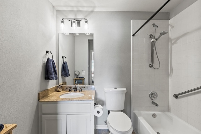 1209 Bel Air Dr, Allen, TX 75013 - bathroom with tub / shower combination, vanity, toilet, and a textured wall
