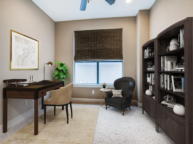 home office with ceiling fan and baseboards