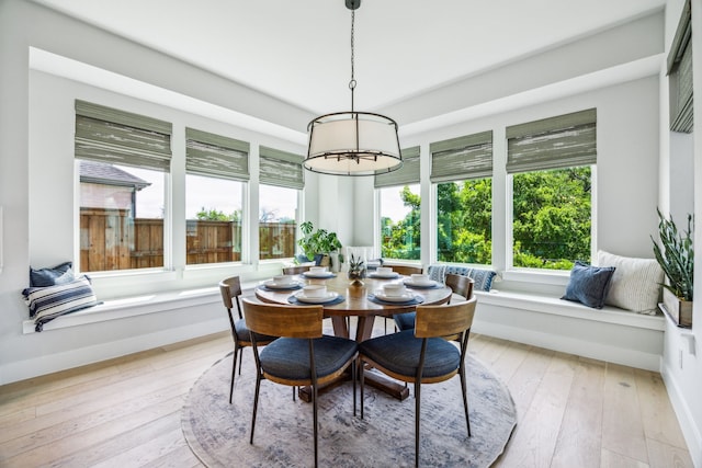 4141 Splitrock Dr, Prosper, TX 75078 - dining room with a chandelier, light wood finished floors, and baseboards