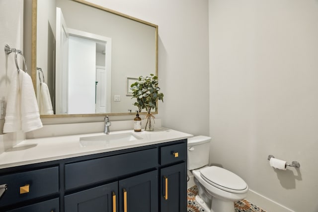 4141 Splitrock Dr, Prosper, TX 75078 - bathroom featuring toilet, vanity, baseboards, and tile patterned floors
