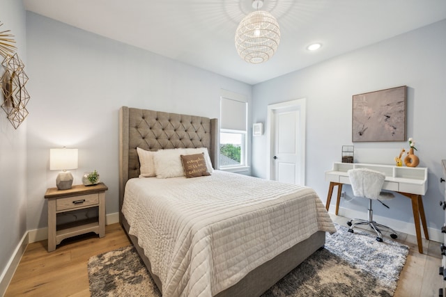 4141 Splitrock Dr, Prosper, TX 75078 - bedroom with baseboards, light wood finished floors, a chandelier, and recessed lighting