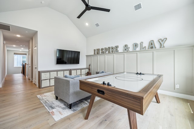 4141 Splitrock Dr, Prosper, TX 75078 - playroom with ceiling fan, a decorative wall, a wainscoted wall, light wood-type flooring, and high vaulted ceiling