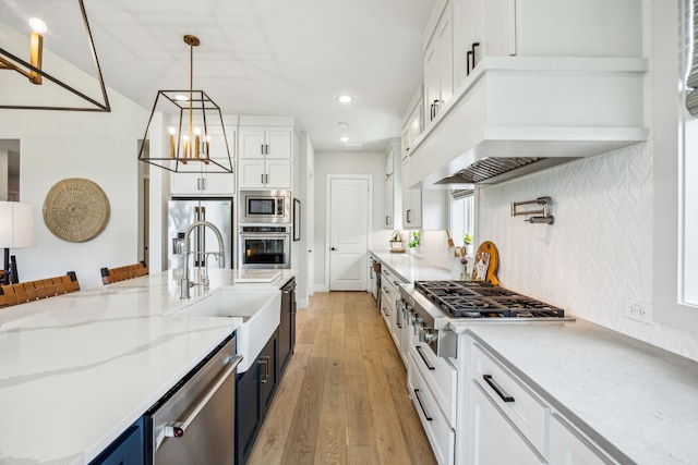 4141 Splitrock Dr, Prosper, TX 75078 - kitchen with appliances with stainless steel finishes, a sink, white cabinets, backsplash, and recessed lighting