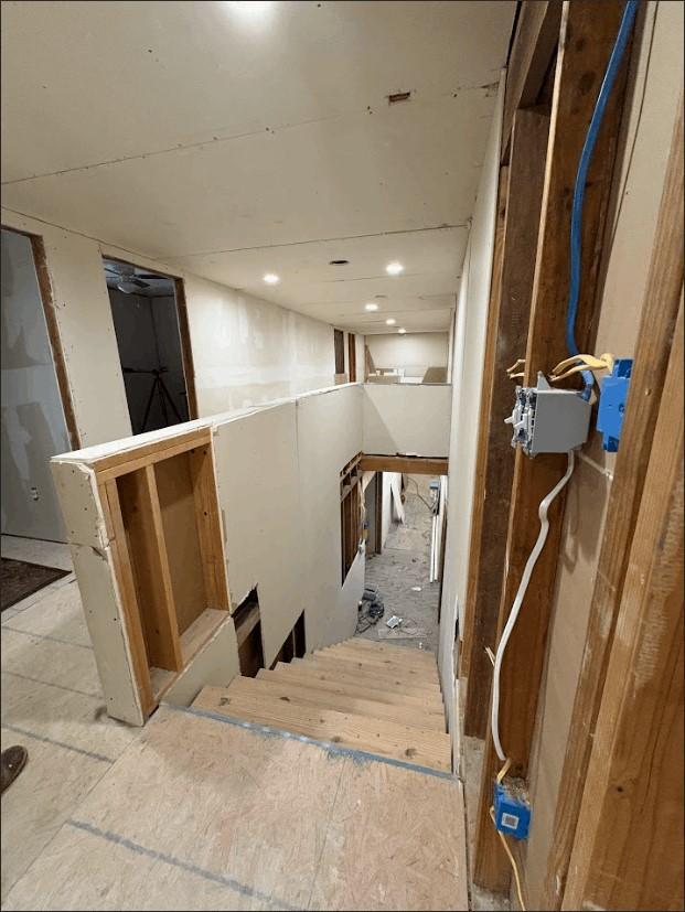 8207 Double Bridge Rd, Mabank, TX 75156 - stairs featuring recessed lighting