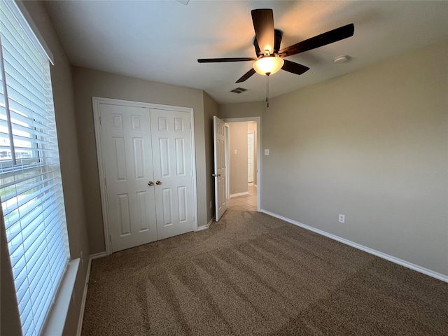 3108 Bryce Dr, Wylie, TX 75098 - unfurnished bedroom featuring light colored carpet, a closet, and ceiling fan