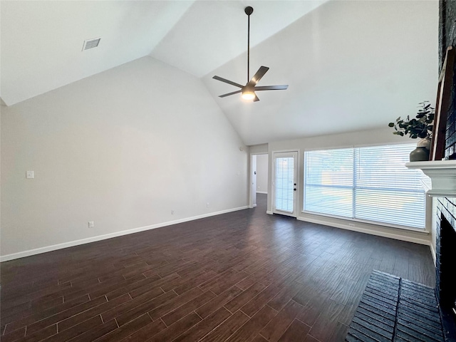 425 N Gaston Dr, Wylie, TX 75098 - unfurnished living room featuring a fireplace, a ceiling fan, baseboards, dark wood finished floors, and high vaulted ceiling