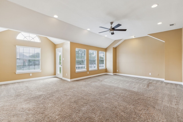 9434 Abbey Rd, Irving, TX 75063 - unfurnished living room with vaulted ceiling, ceiling fan, carpet flooring, healthy amount of natural light, and recessed lighting